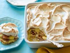 a casserole dish with white frosting on top