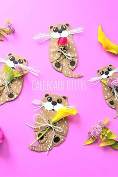 paper plate crafts made to look like animals with flowers and leaves on pink background that says cardboard otters