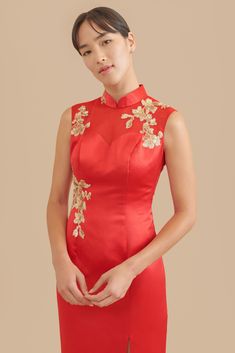 Less is more with this simple, yet elegant sheath qipao. We took the classic cheongsam silhouette and modernized it with delicate floral embroidery, a front slit, and a sheer mesh back. If you’re looking for something modest and classy for your tea ceremony, then look no further. Groom's outfit recommendation: Pair this with our Shang Jacket or Classic Brocade Bowtie. Accessory recommendation: Pair this with our Sunrise Hairpin. This dress is named after Grace Lee Boggs, who was an American auth 00s Wedding Dress, Wedding Dress Film, Chinese Bridal Dress, Red Chinese Wedding Dress, Vietnamese Wedding Dress, Wedding Cheongsam, Traditional Chinese Wedding, Modern Qipao, Wedding Dress Prices