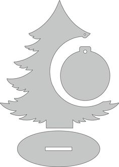 a christmas tree cut out from the shape of a circle with an ornament on top