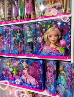 barbie dolls on display in a toy store