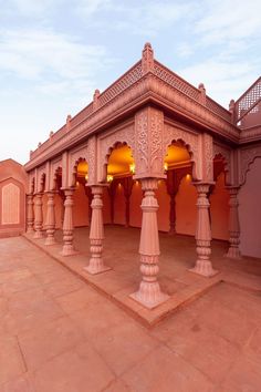 an ornate building with pillars and arches