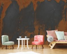 three chairs and two tables in front of a wall with black paint on the walls