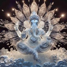 an elephant statue is shown in the middle of water and surrounded by bubbles, stars and sparkles