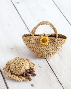 a straw bag and hat sitting on top of a white wooden floor next to each other