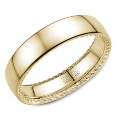 a yellow gold wedding ring with rope detailing