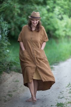 "PAINTER linen dress | button up linen dress | breastfeeding friendly Each item is individually cut and sewn by order, especially for you. Handmade, quality items take time, please allow approx.4 weeks for your order to be made. Thanks so much for your patience. ABOUT THE ITEM: *100% pure linen *laundered *Colour: GINGER BROWN (medium weight linen) *half sleeves *straight silhouette, is made to be loose *two big patch front pockets *button up *coconut buttons *can be made custom length (from the Brown Linen Dresses With Pockets, Lagenlook Beach Dress With Pockets, Beach Lagenlook Dress With Pockets, Linen Tunic Dress With Pockets, Oversized Linen Beach Dress With Pockets, Bohemian Linen Dresses With Pockets, Lagenlook Linen Beach Dress, Ginger Brown, Buttoned Dress