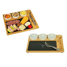 two serving trays with food and utensils on them