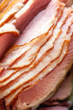 sliced ham sitting on top of a cutting board