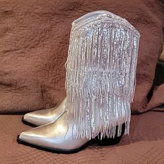 New Never Worn Size 7 Metallic Faux Leather Pull-On Bootie Side Zip Detail Cushioned Footbed 9 1/2" Shaft 2 3/4" Heel Slight Scuff On Toe And Heel As Seen In Photos Otherwise Perfect New Condition. Silver Fitted Snip Toe Boots, Western Party Boots With Fringe, Elegant Silver Boots With Rhinestone Fringe, Metallic Silver Boots For Fall Party, Silver Evening Boots For Spring, Metallic Silver Party Boots For Fall, Glamorous Silver Winter Boots, Silver Pointed Toe Boots For Winter, Silver Pointed Toe Winter Boots