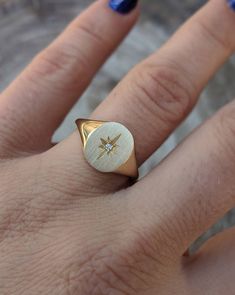 Our solid gold starburst signet ring features a cosmic star set with a sparkling diamond. Choose from 14k, 18k yellow, rose, white gold or platinum. Prefer a colored gemstone in place of the diamond? Just leave us a note at checkout. This ring is a lovely addition to your celestial fine jewelry, and makes a meaningful, timeless (and cool!) gift for your loved ones this holiday season. Details: - Made at our family-run studio in NYC. - Solid 14k, 18k yellow, rose, white gold or platinum -- choose Star-shaped Single Cut Diamond Wedding Jewelry, Starburst Brilliant Cut Jewelry For Anniversary, Star Shaped Signet Ring With Polished Finish, Luxury Star-shaped Rings With Single Cut Diamonds, Celestial Yellow Gold Signet Ring For Formal Occasions, 14k Gold Celestial Diamond Ring Vvs Clarity, 14k Rose Gold Signet Ring With Diamond Accents, Celestial 14k Gold Jewelry With Brilliant Cut, Rose Gold 14k Gold Signet Ring With Diamond Accents