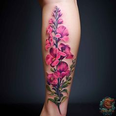 a woman's leg with pink flowers and leaves on the side of her body