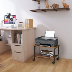 a computer desk with a printer on top of it