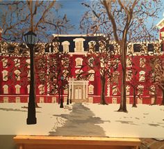 a painting of a red building with trees in the foreground and snow on the ground