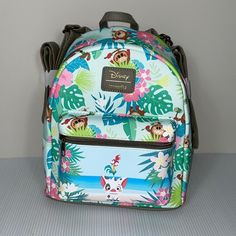 Loungefly Brand. Disney Brand. This Is A Loungefly Mini Backpack For The Movie Moana. Featuring The Two Sidekicks Pua And Hei Hei In A Tropical Paradise Surrounded By Those Adorable Coconut Bad Guys, The Kakamoras. So Cute. New With Tags. Disney Green Travel Bags, Green Disney Travel Bag, Disney Travel Backpack, Disney Style Backpack For Travel, Disney Travel Bags With Detachable Strap, Disney Standard Backpack For Travel, Disney Style Standard Backpack For Travel, Green Disney Backpack For Travel, Disney Green Travel Backpack