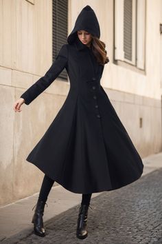 FEATURES 40% wool blend, 60% fiber, nylon Polyester lining Single breasted buttons closure Two side pockets Flared wool coat Asymmetric hem length Perfect for winter, autumn Dry clean We also have this coat in blue color  https://etsy.me/3ZhrDb0 If you need it in other colors, please contact with us. ★★Mode size Height 170cm (5′ 7″)  Bust 84 cm (33")  Waist 66 cm (26")  She wears size XS. ★★Bespoke Order Service If you Request other color Request the length Your height is not between 155 cm- 175 cm Your weight is not between 47 kg -77 kg I can do it for you, It will need some extra fee depending on on your need. Contact with me for more detail. ★★ Warmly Note: 1 ) : Please confirm your shipping address! If you wish to ship the item to a different address, please send me a message immediate Tailored A-line Outerwear For Winter, Fitted A-line Fall Outerwear, Fitted A-line Outerwear With Button Closure, Fitted A-line Wool Coat For Spring, Fitted A-line Spring Wool Coat, Spring A-line Fitted Wool Coat, Tailored A-line Winter Outerwear, Tailored A-line Outerwear For Fall, Fitted A-line Outerwear For Work