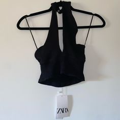 Black Halter Crop Top. Ribbed Fabric Nwt There Are Buttons On The Neck Area To Hold Straps Up. Size Medium Black Fitted Crop Halter Top, Zara Black Cropped Top, Edgy Halter Neck Crop Top, Black Seamless Crop Top Halter, Zara Sleeveless Black Crop Top, Black Halter Crop Top, Black Halter, Halter Crop Top, Zara Black