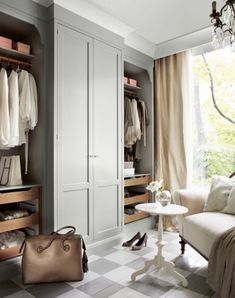 the closet is organized and ready to be used as a dressing room or bedroom area