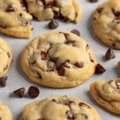 chocolate chip cookies on a baking sheet ready to be eaten