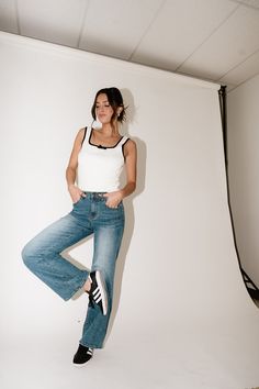 your new go-to wide leg jeans, these medium wash denim pants feature subtle vintage-inspired distressing for that ‘worn-in’ feel. with their high-waisted fit + relaxed wide leg silhouette, they’re perfect for pairing with tanks + tees, season after season. medium indigo // wide leg, high waisted, one button zip fly, belt loops, pockets paired with our right time striped polo + josephine tank model is 5'8" + wearing a small measurements are approximate + taken while laying flat small : waist 26” Wide Leg Denim, Small Waist, Spandex Fabric, Wide Leg Jeans, Denim Pants, Leg Jeans, Carry On, Vintage Inspired, Wide Leg