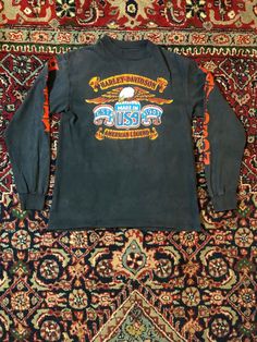 Condition Rating:  Poor-might have stains or holes Decent-might be heavily worn holes but worn to perfection   Good-might have been worn but no stain and has good color Great-might have been worn but is close to brand new Excellent or Dead Stock-Never worn Vintage 1980s Harley Davidson t-shirt   Measurements Pit to Pit 20" Collar to Tail 25" Tag says M but go by measurements listed above Any questions message me Acid Wash Long Sleeve T-shirt With Graphic Print, Vintage Long Sleeve T-shirt With Logo Print, Acid Wash Long Sleeve T-shirt With Letter Print, Retro Long Sleeve T-shirt With Logo Print, Vintage Long Sleeve T-shirt With Letter Print, Vintage Long Sleeve T-shirt With Screen Print, Vintage Long-sleeve Graphic Print T-shirt, 90s Style Long Sleeve Fan Merchandise T-shirt, 90s Long Sleeve T-shirt For Fan Merchandise