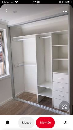 a white closet with drawers and shelves next to a window