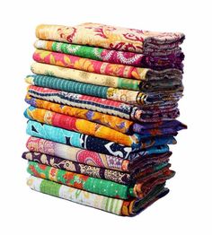 a stack of multicolored cloths sitting on top of each other