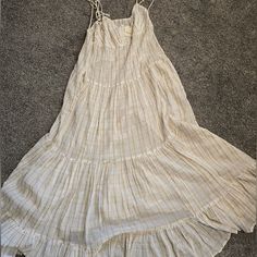 Maxi Sheer Free People Dress. Size Medium But The Fit Of Dress Can Fit Any Size Because Of The Cut Color- White With Light Green Square Print Casual Cream Maxi Dress For Day Out, Casual Cream Daytime Dress, Casual Cream Dress For Daytime, Casual Maxi Length Sundress For Daytime, Casual Maxi Sundress For Daytime, Bohemian Cotton Maxi Dress For Daytime, Casual Cream Cotton Sundress, Casual Flowy Maxi Dress For Daytime, Flowy Casual Maxi Dress For Daytime