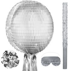 a silver disco ball and some other items