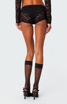 Online Only! Make a sultry statement with Edikted's Estella Sheer Lace Micro Shorts – a cute and daring pair designed to turn heads. The extra-short fit, sheer lace fabric, low rise, and stretchy, fitted silhouette create an alluring look that adds a touch of intrigue wherever you go.


	Low rise
	Stretchy
	Sheer lace
	Micro shorts
	Model wears size S
	Model height is 5'9
	Item care: Wash with similar color Fitted Glamorous Short Bottoms, Glamorous Fitted Shorts, Glamorous Fitted Short Length Bottoms, Glamorous Fitted Short-length Bottoms, Flirty Short Bottoms For Party, Flirty Short Party Bottoms, Elegant Short Leg Bottoms For Night Out, Elegant Short Bottoms For Night Out, Trendy Sheer Party Bottoms