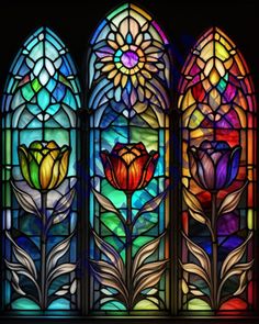 a stained glass window with flowers in it