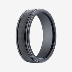 a men's wedding band with black ceramic inlay