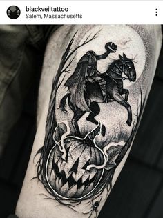 a man's arm with a black and white tattoo on it, depicting a horse riding