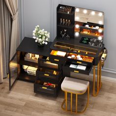 a vanity with stools and lights on it