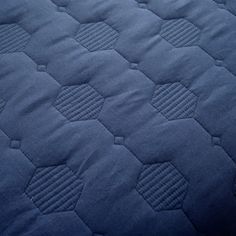 an image of a blue mattress that is close up