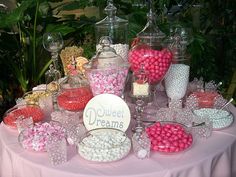 a table topped with lots of candy and candies