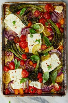 a pan filled with vegetables and tofu