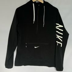 Nike Hoodie Top Nwot Super Lightweight Black Size Xs But Runs Very Big/Roomy Front Pocket Hoodie Attached Great For Rainy Days Black Half-zip Hoodie For Sports, Black Half-zip Hoodie Sportswear, Functional Hooded Tops For Streetwear, Black Half-zip Hoodie With Drawstring Hood, Functional Hooded Streetwear Tops, Black Hooded Track Jacket With Letter Print, Athleisure Long Sleeve Outerwear With Logo Print, Functional Black Top With Drawstring Hood, Functional Black Tops With Drawstring Hood