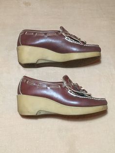 "1970s women's loafers brand- Dex brown leather upper kiltie w/tassel moc toe rubber sole slight raised back white stitching 360 degree laces (functional) good vintage condition, light wear label size 7, see below measures, lying flat, insole-9 1/4\" sole-9 3/4\" width-3 1/4\" heel-2 1/4\" total height-4 1/2\"" Womens Loafers, 1970s Women, Vintage Converse, Women's Loafers, Womens Shoe, Wedge Loafers, Loafer Shoes Women, Leather Tassel, Chuck Taylor All Star