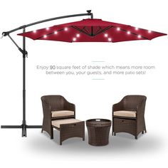 two chairs and an umbrella with red lights on them are shown in front of a white background