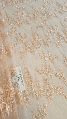 Peach 3D lace hand made fabric, Luxury hand made pearl beads by 3D flowers, French Lace, Embroidered lace, Wedding Lace, Bridal lace K00759 Article: K00798 Width: 125 cm Colors: peach Lace edge: Both sides scalloped The price is per meter (1 meters= 100 cm / 55.1 inch) Please note, there might be a slight difference in the color according to PC and Mobile devices! We recommend you to buy a sample before ordering to see the true color. You can purchase a sample here: https://www.etsy.com/listing/ Elegant Tulle Fabric With 3d Lace Embroidery, Elegant Lace Tulle Fabric With 3d Embroidery, Peach Lace, Scalloped Border, Dress Tops, Wedding Lace, Embroidery Floral, Lace Bridal, 3d Flowers