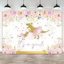 a pink and gold unicorn themed wall hanging in a room with lights on the ceiling