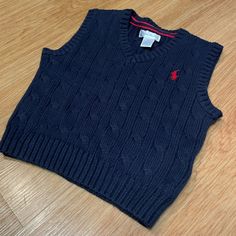 Brand New! Navy Blue Sweater Vest With Red Stitched Logo. Navy Cotton Sweater Vest For Winter, Blue Winter Playwear Tops, Blue Winter Tops For Playwear, Blue Tops For Playwear In Winter, Ralph Lauren Cotton Winter Tops, Ralph Lauren Blue Winter Tops, Blue Cotton Sweater Vest For Winter, Casual Blue Ralph Lauren Sweater, Blue Cotton Ralph Lauren Sweater