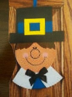 an image of a paper cut out of a man wearing a top hat