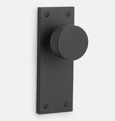 a black door handle with a round knob