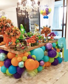 an instagram page with balloons and flowers on the table in front of it, which reads instagram