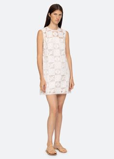 The Melia embroidered tank dress features a floral embroidered patchwork design and mini silhouette. Details: - 100% cotton - invisible back zipper - model is 5'10'' and wearing a size 4 Embroidered Tank, Sea Ny, Patchwork Designs, Tank Dress, Dress Shop, Slip Dress, Short Dresses, White Dress, Size 4