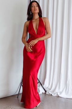 Red, satin dress Bust lined Halterneck style Boning in bodice Satin rose feature in back Zipper in side Can we take a moment for this dress? Our Of Your Dreams dress is sure to make jaws drop! We are obsessed with its satin rose embellishment in the back and classic halter silhouette. Perfect for any occasion where you really need to leave a lasting impression. Team it with clear heels and a satin clutch and watch heads turn. MODEL INFO Model is wearing size XS Height: 5'2" Bust: 33.5" Waist: 25 Red Formal Dresses, Satin Halter Dress, Red Satin Dress, Satin Clutch, Red Homecoming Dresses, Satin Roses, Gown Prom, Ball Gowns Prom, Clear Heels