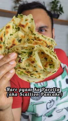 a man holding up some food in his hand with the caption that reads, mare papaa la paracela aka stallion pancake