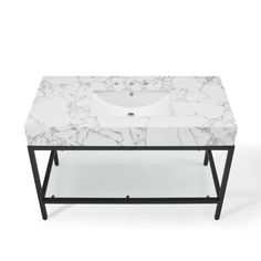 a white marble table with black legs and a sink in the middle, against a white background